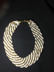 White and gold necklace